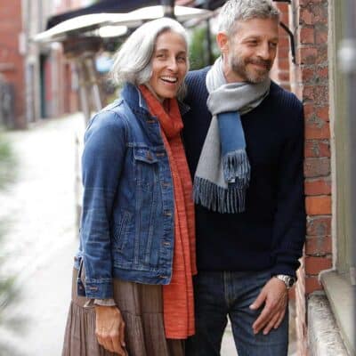 Swans Island Company's Kennebunk Wrap is knit with soft Merino Silk. Hand-dyed colors. Made in USA. Shown here in Persimmon.