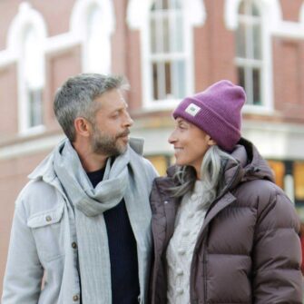 The Swans Island hat is knit in the USA with soft silk + Merino wool. Shown here in Plum.