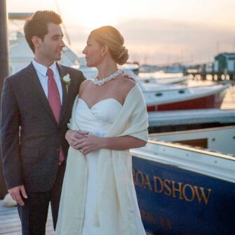 Celebrate your special day in Swans Island style with handwoven wraps for the whole bridal party. Soft organic merino wool and silk wraps are handwoven in Maine. Our bride wears the Boothbay Wrap in Ivory.
