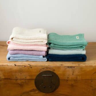 Swans Island Company's Cotton Waffle Baby Blanket is squishy and soft - perfect for tender babes. Made in Maine with 100% American cotton. Shown here in Balsam. Available in an array of lovley colors.
