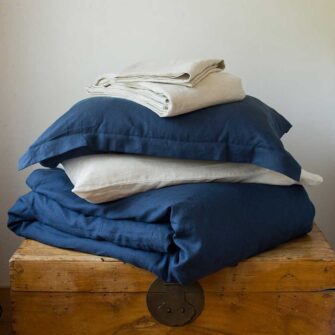 Swans Island Company - Shop the Look - Farmhouse Linen Bedding Bundle. Classic Sheet set in Flax + Relaxed Duvet Set in Midnight.