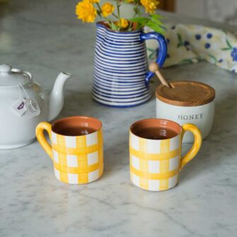 Grid Terracotta Mug. Handcrafted in Portugal. Shown here in Tangerine Yellow. Set of two.
